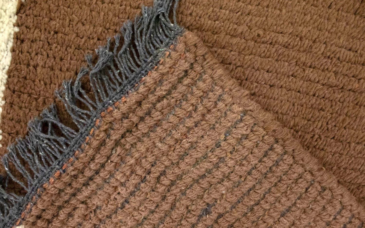 Nepal Teppich 140 x 70 cm - braun