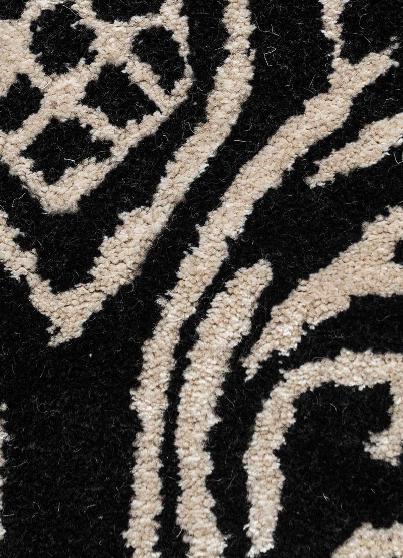 Wollteppich - 240 x 150 cm - schwarz-weiß