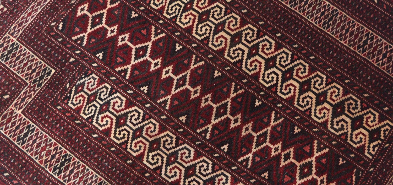 Afghan Teppich - Buchara 120 x 90 cm - dunkelrot